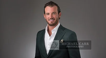 Professional Photographer Houston Houston Business Portrait on Gradient Gray Background