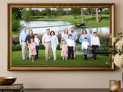 Extended family portrait including grandparents framed and displayed on a wall in home