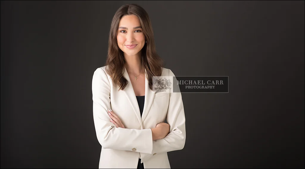 Professional Photographer Houston Houston Modern Casual Headshots of a business professional wearing a white blouse and blazer
