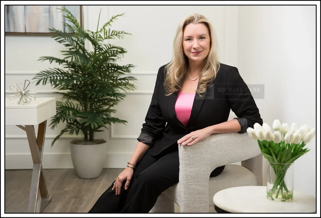 Professional Photographer Houston Business branding portrait of a professional woman in a contemporary office-inspired studio set in Houston.