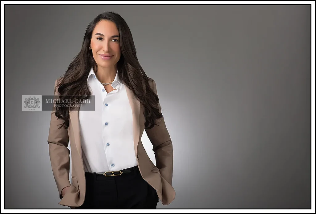 Professional Photographer Houston Houston modern casual headshot of a business professional wearing a beige blazer and white button-down shirt