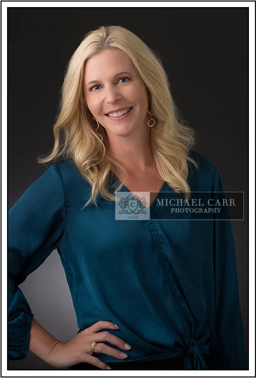 Professional Photographer Houston Houston modern casual headshot of a business professional wearing a teal blouse