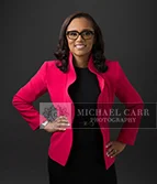 Professional Photographer Houston Full-length studio portrait of a businesswoman photographed during a Houston personal branding photography session.