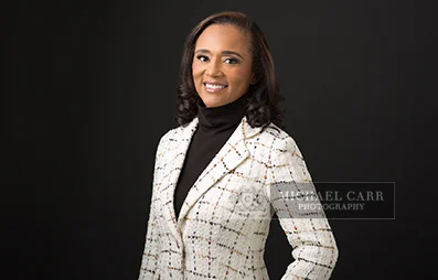 Professional Photographer Houston Three-quarter studio portrait of a businesswoman created during a Houston personal branding photography session.