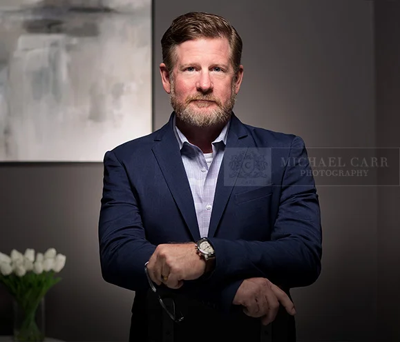 Professional Photographer Houston Personal branding portrait of a Houston business professional photographed at Michael Carr Photography.