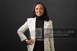 Professional Photographer Houston Studio portrait of a businesswoman wearing a white blazer for a Houston personal branding photography session.