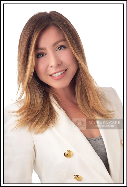 Professional Photographer Houston Professional headshot of a businesswoman photographed in the Michael Carr Photography studio in Houston.