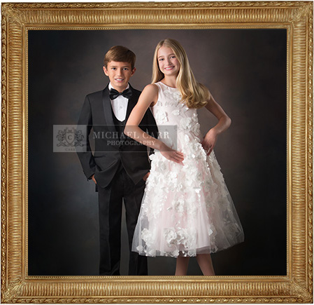 Formal portrait of siblings dressed for a special occasion in a gold frame Formal portrait of siblings dressed for a special occasion in a gold frame